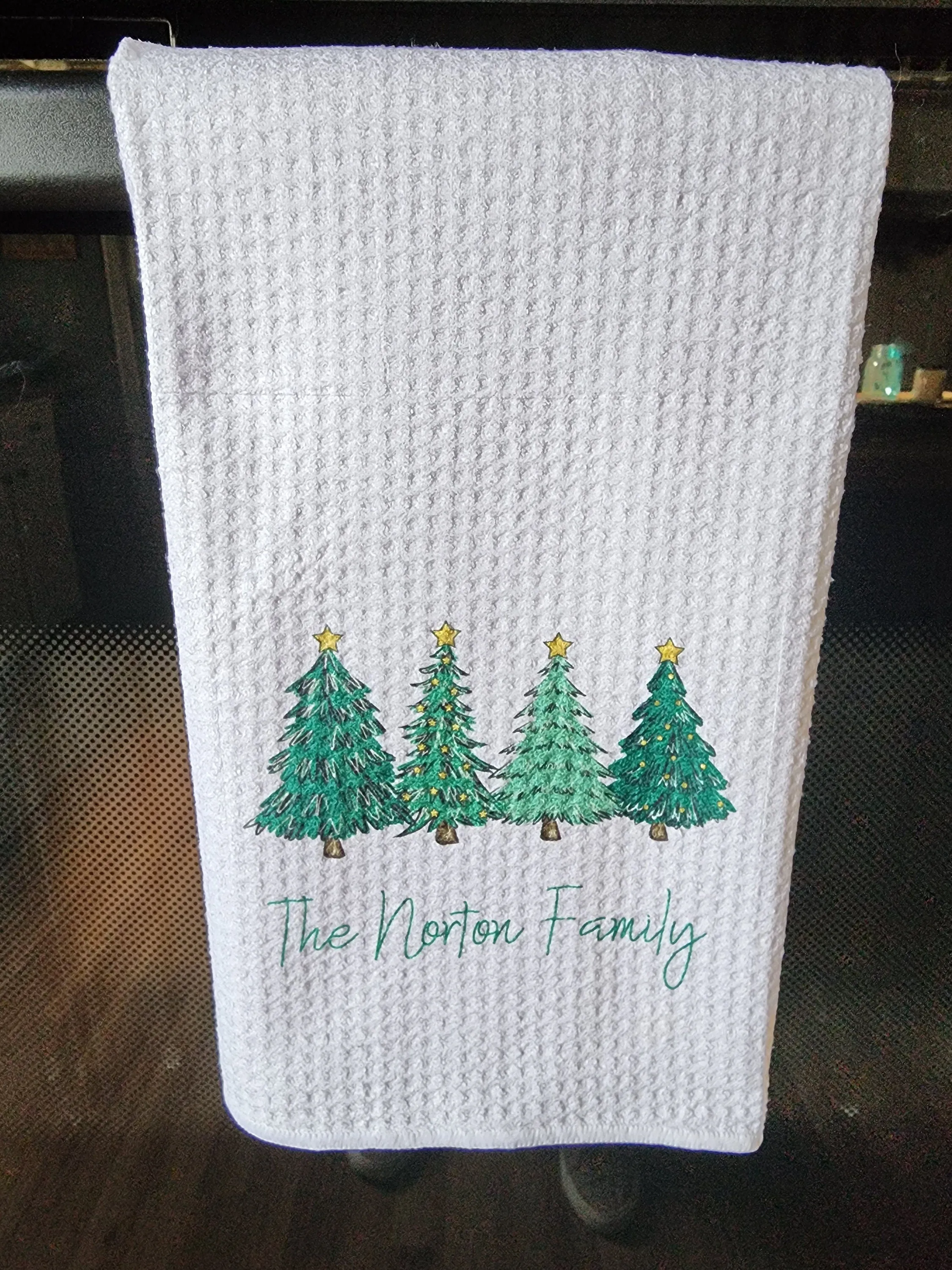 Kitchen Tea Towel with Family Name and Row of Christmas Trees Towel - Tea Towel - Bar Towel Gift for Home Holiday Gift Hostess Gifts