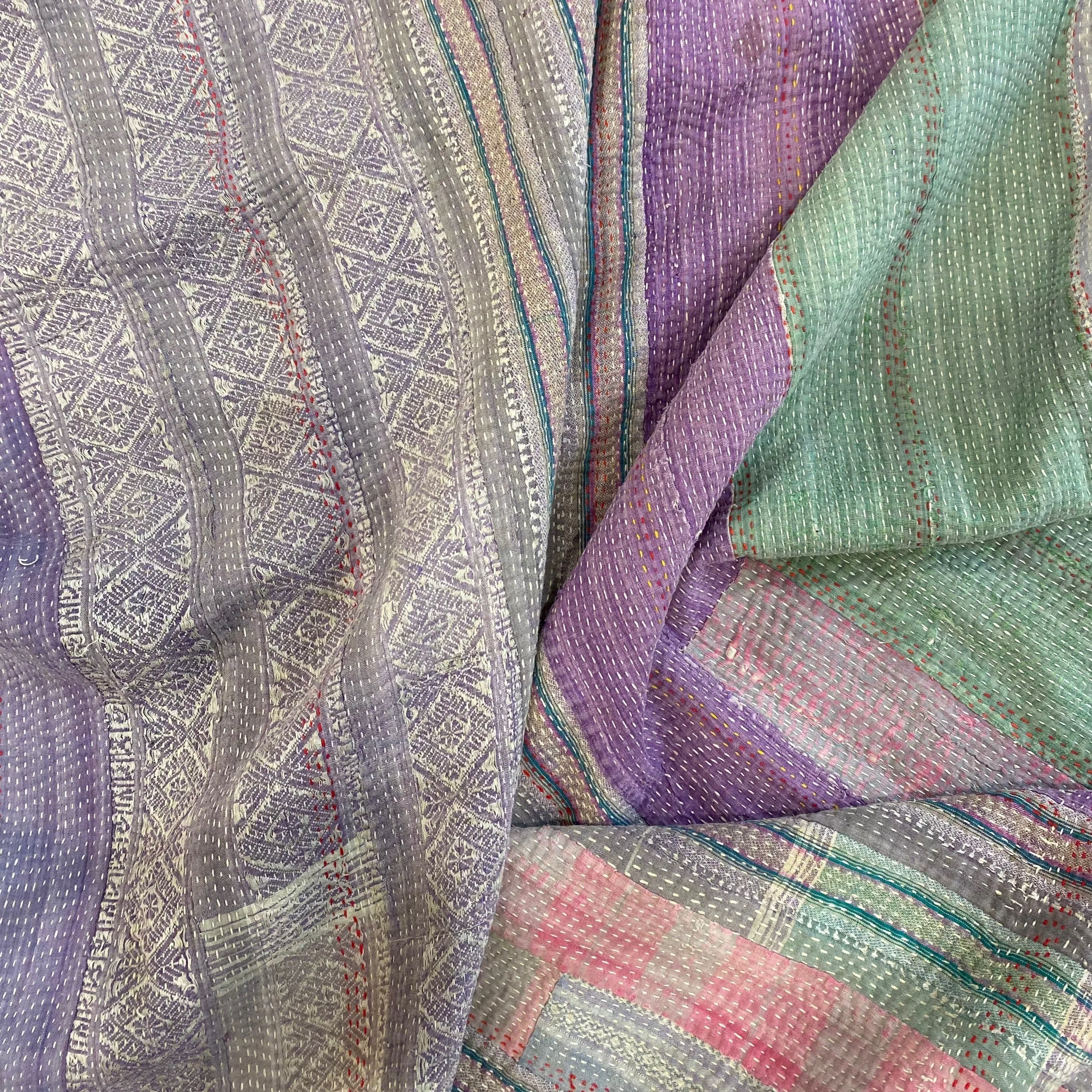 Vintage Kantha with a muted soft side and a dramatic purple side.